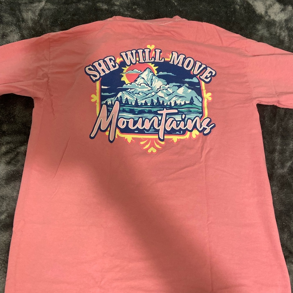 This is a light pink long sleeve shirt size med.